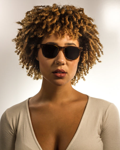 Huntington Beach Polarized Square Walnut Wood Sunglasses worn by a customer model