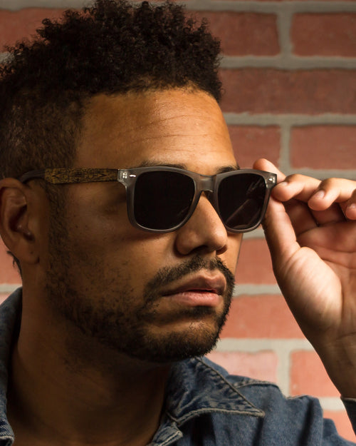 Rockport Polarized Round Bamboo Sunglasses worn by a customer model