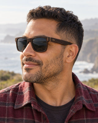 Half Moon Bay polarized sunglasses worn by a man on the coastal trail at Half Moon Bay