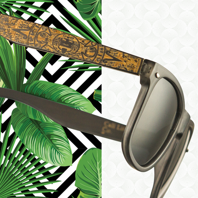 Rockport folded sunglasses view showing bamboo wood temple construction and hinge, Cali Life Co lifetime warranty